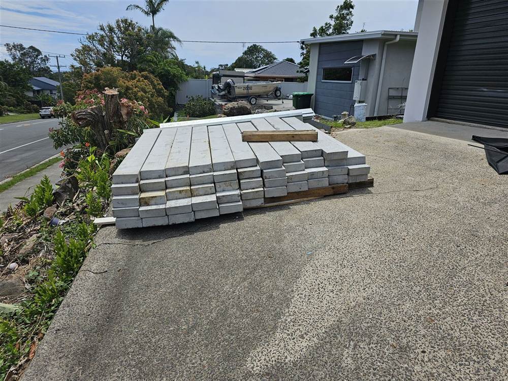 Concrete sleepers stacked on site ready to be installed